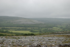 Karst pavements and topography of the Burren approx 5km south of Ballyvaughan Co Clare Ireland. Exposures of the Dinantian Burren Limestone Formation are composed of shallow water carbonates. Note the clints (limestone blocks) and grikes (joints formed by Variscan folding (Coller, 1984) and fracturing) enlarged by Pleistocene disolution (Williams, 1966).